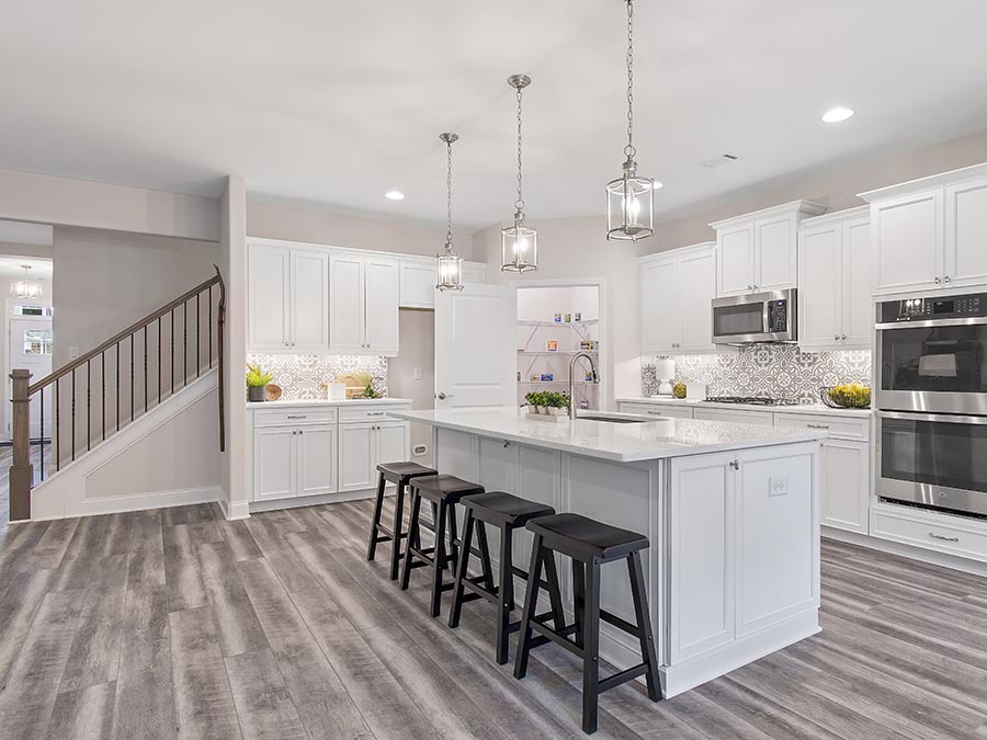 The spacious and open kitchen of the Emerson homeplan at Echols Farm